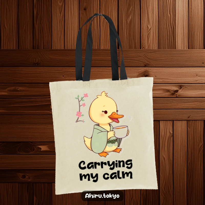 Funny Tea Sipping Duck Tote Bag: A duck in a patterned kimono delicately sips tea, a perfect, humorous accessory for daily outings.